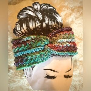 Hand made, crocheted headband/ ear warmers. Features shades of aqua/purple/pink
